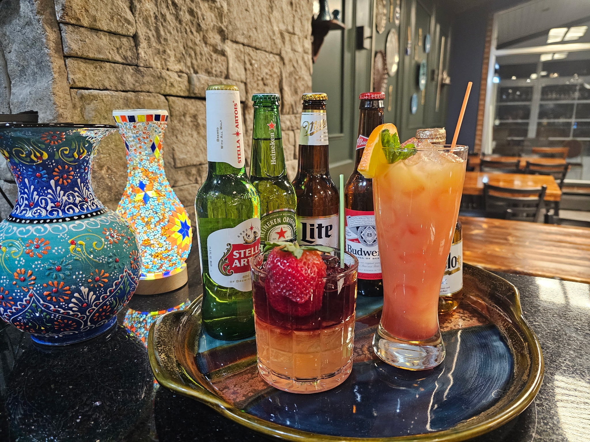 Emily's bar counter with cocktails and Turkish vases