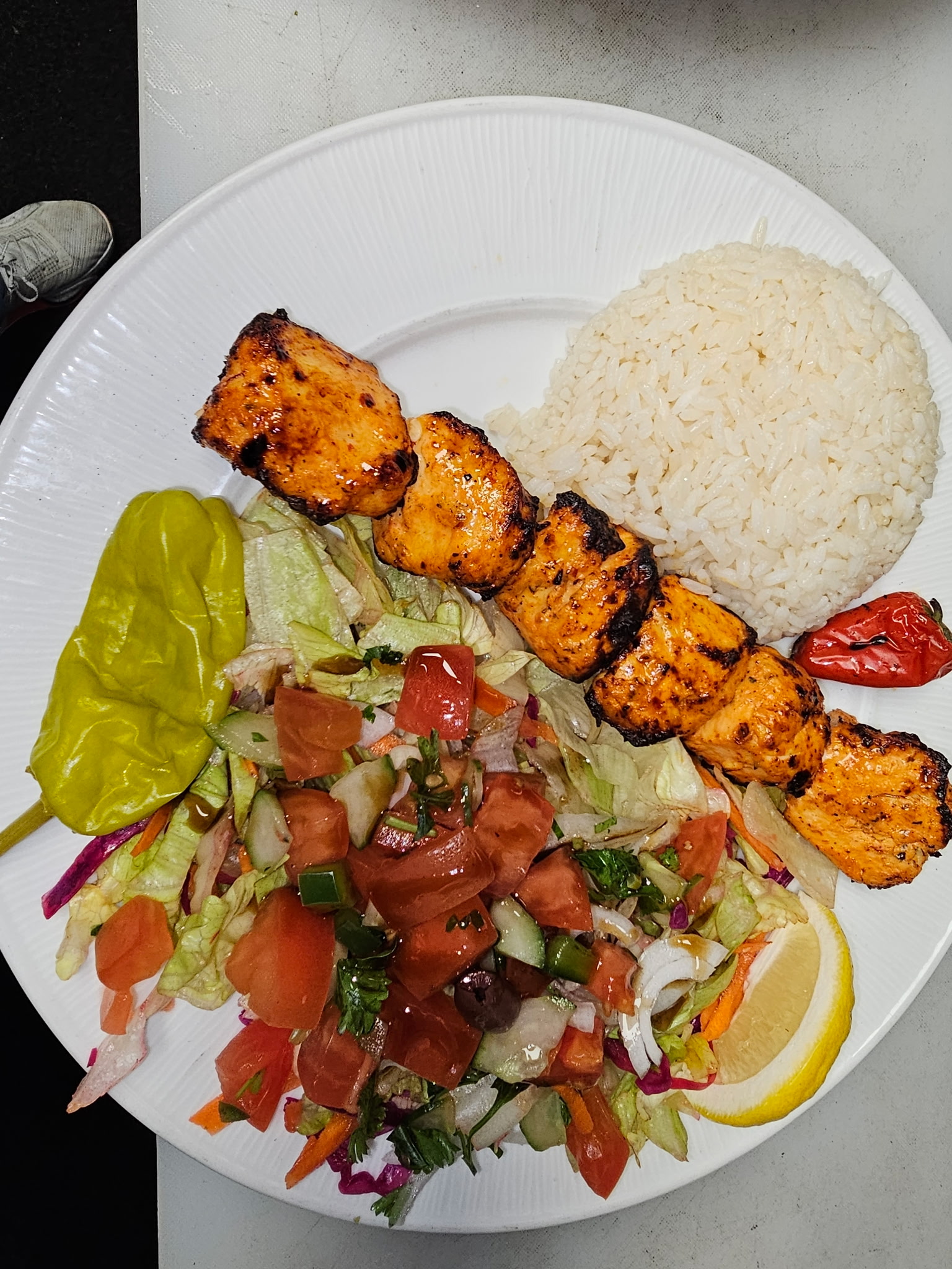 Chicken shish kebab with rice and house salad