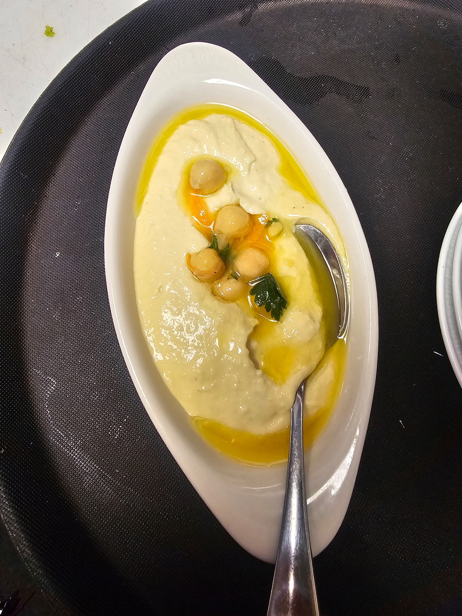 Hummus with olive oil and chickpeas