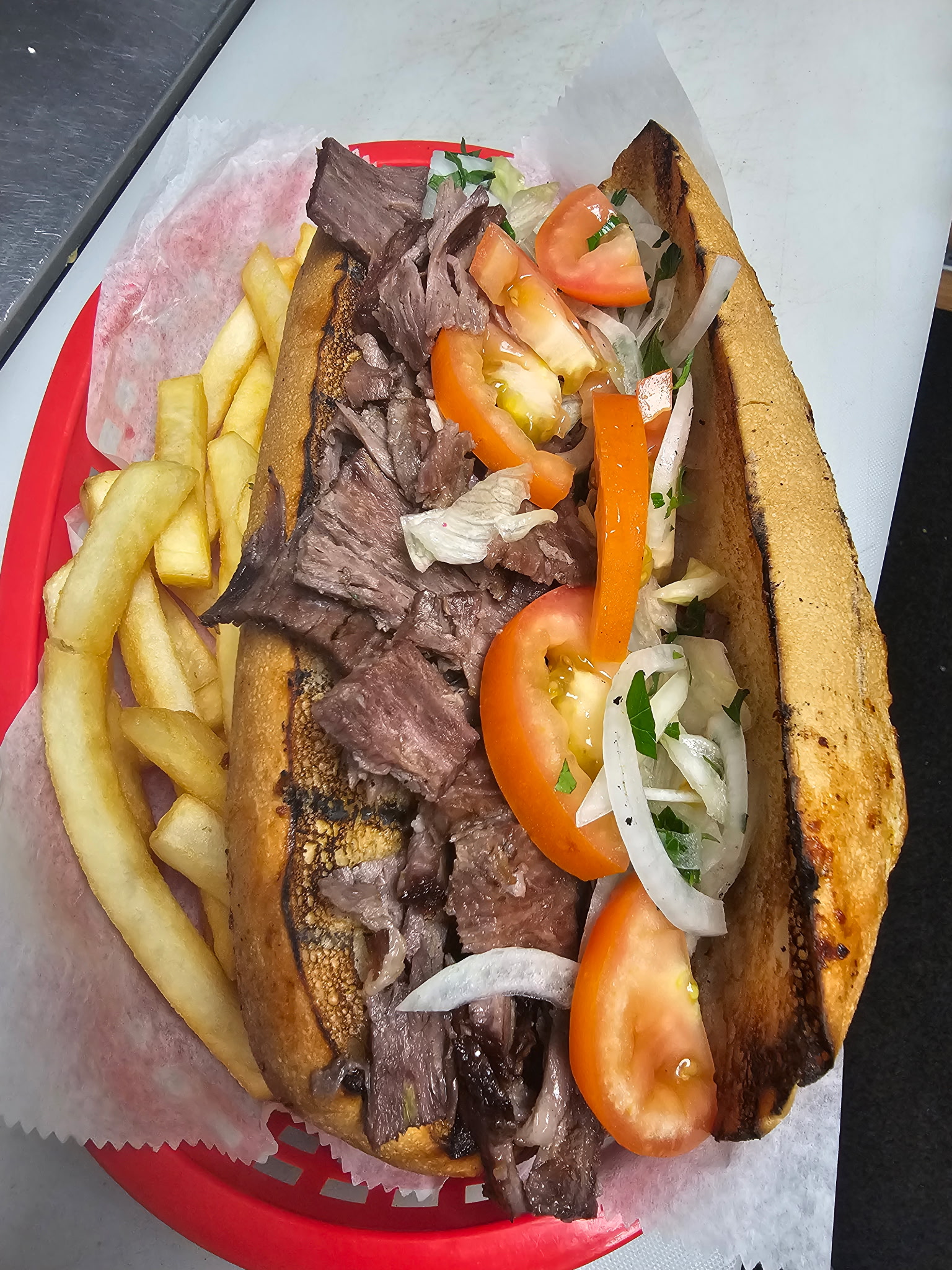 Beef sub sandwich with fries
